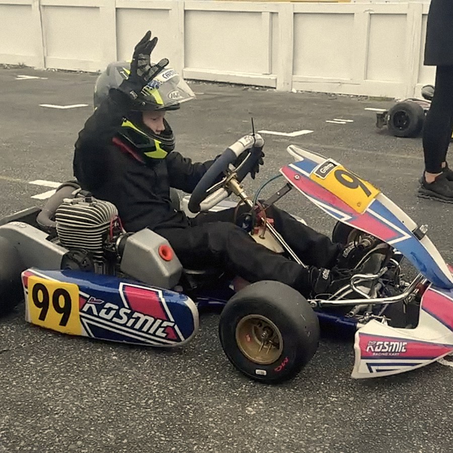 Wave from the kart before the race